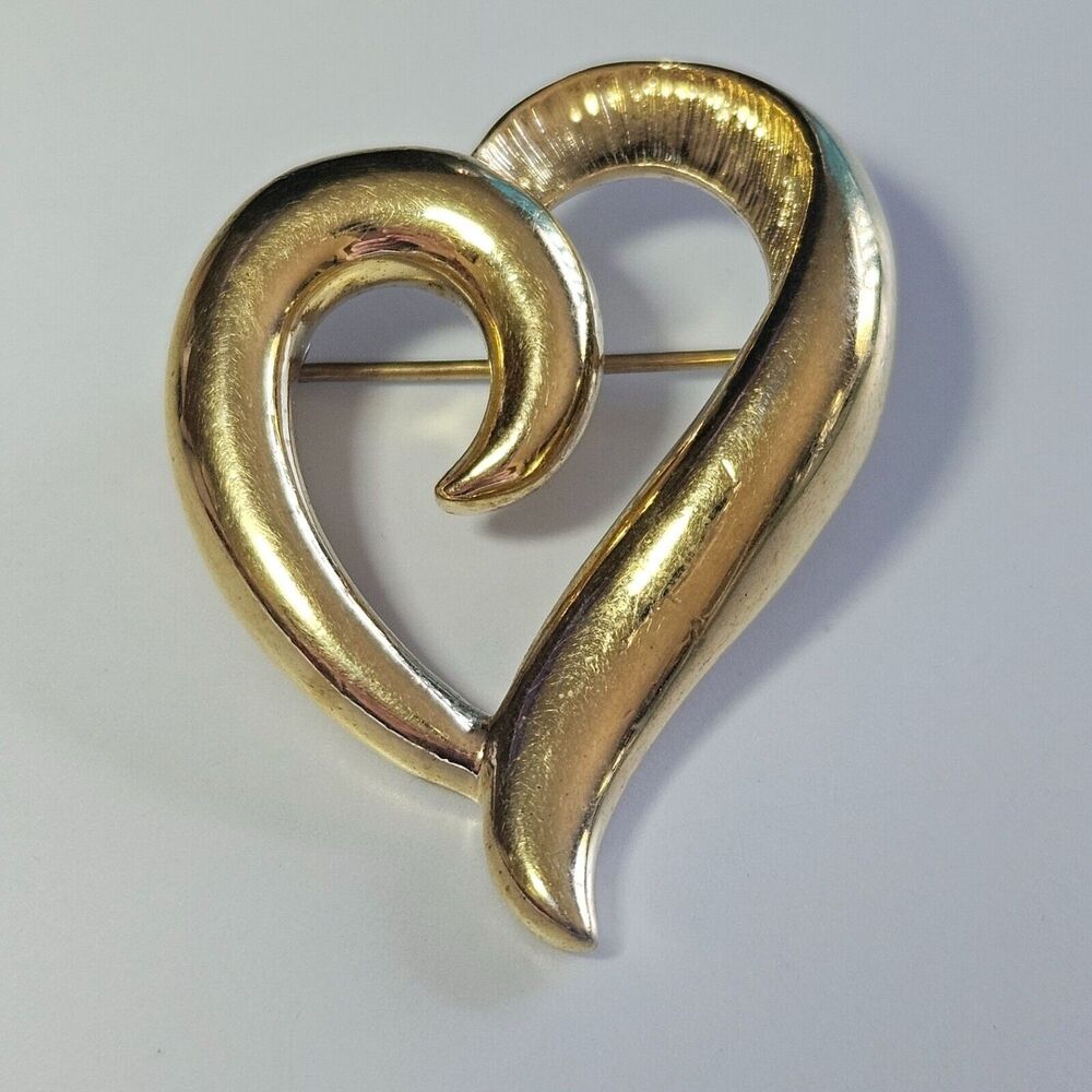 Napier gold tone open heart brooch